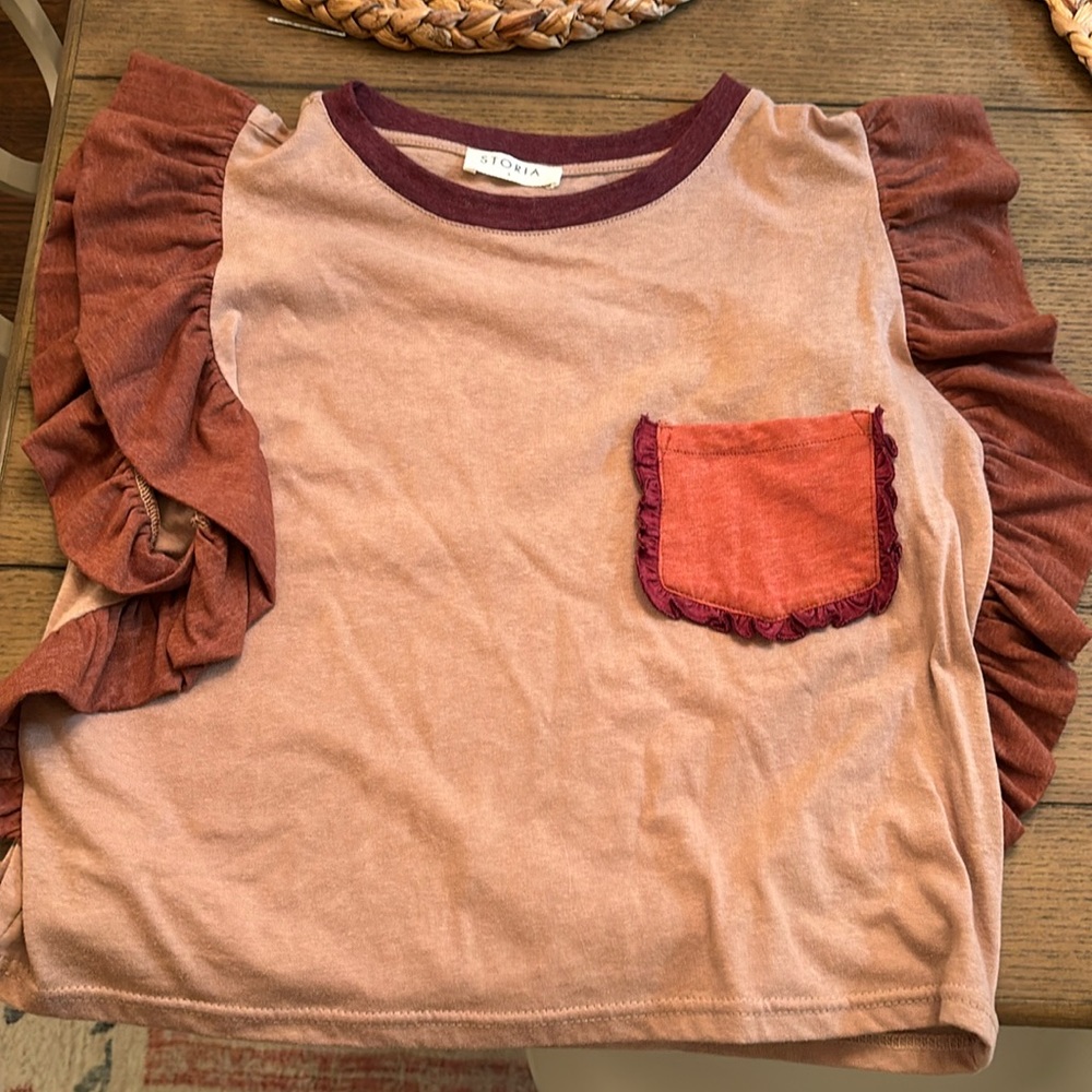 Boutique flutter sleeve pocket tee